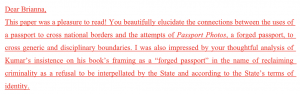 A professor's feedback is written in red and praises a well-written essay.